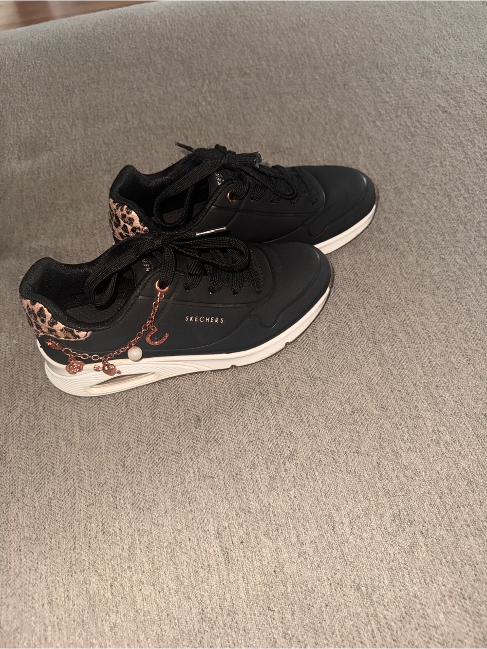 Skechers Black Sneakers with Leopard Heel and Rose Gold Charm
